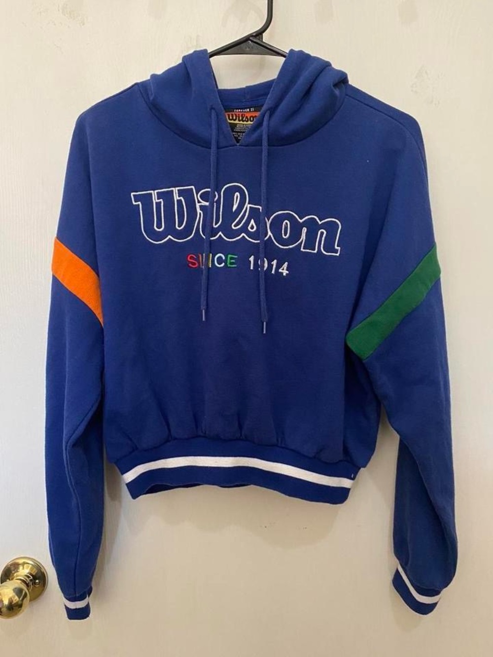 Forever 21 Blue Hoodie with Red and Yellow Logo Stripe